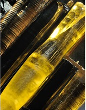 cylindrical single crystals of strontium holmium oxide and titanium oxides.